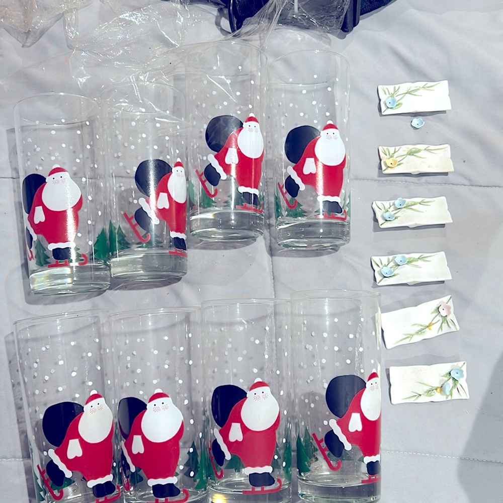 Eight vintage Santa on skates tall glasses, Crate & Barrel